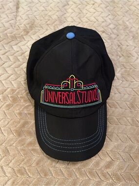 Universal Black Baseball Cap with White Text and Red Accent